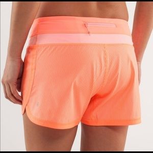peach and coralish-orange lulu shorts